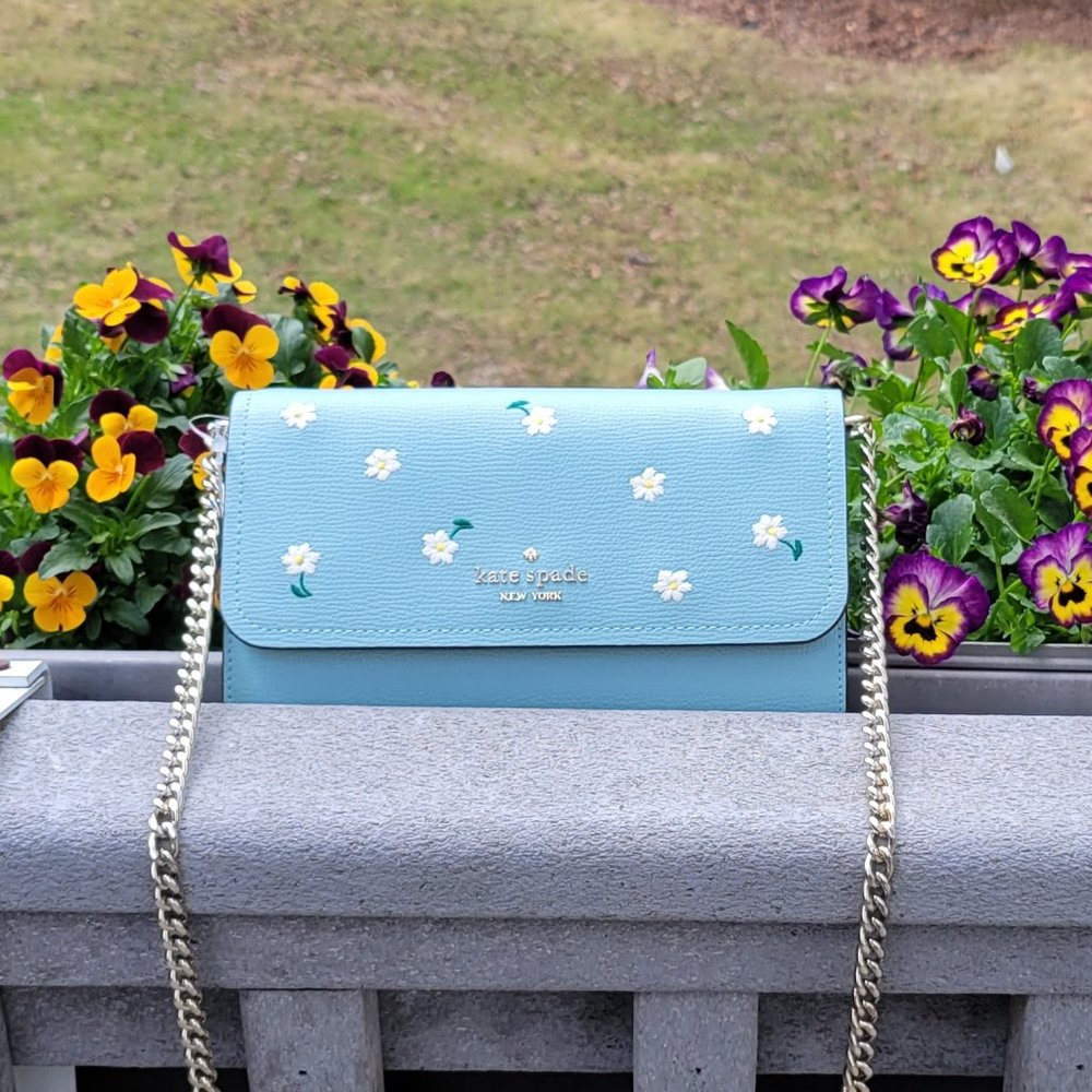 Kate Spade New York Leather Crossbody purse with embroidered flowers and chain